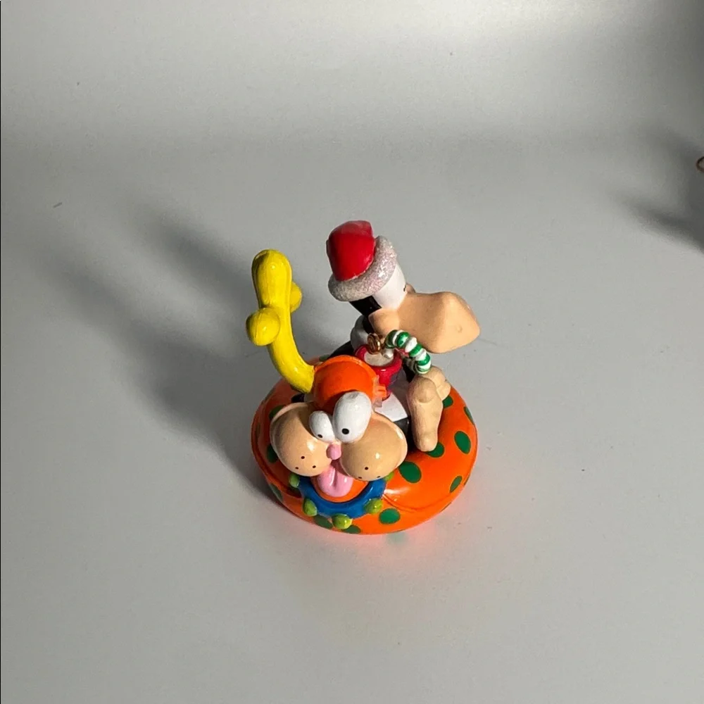 Opus Festive‎ Cartoon Character Toy with Orange and Yellow Accents